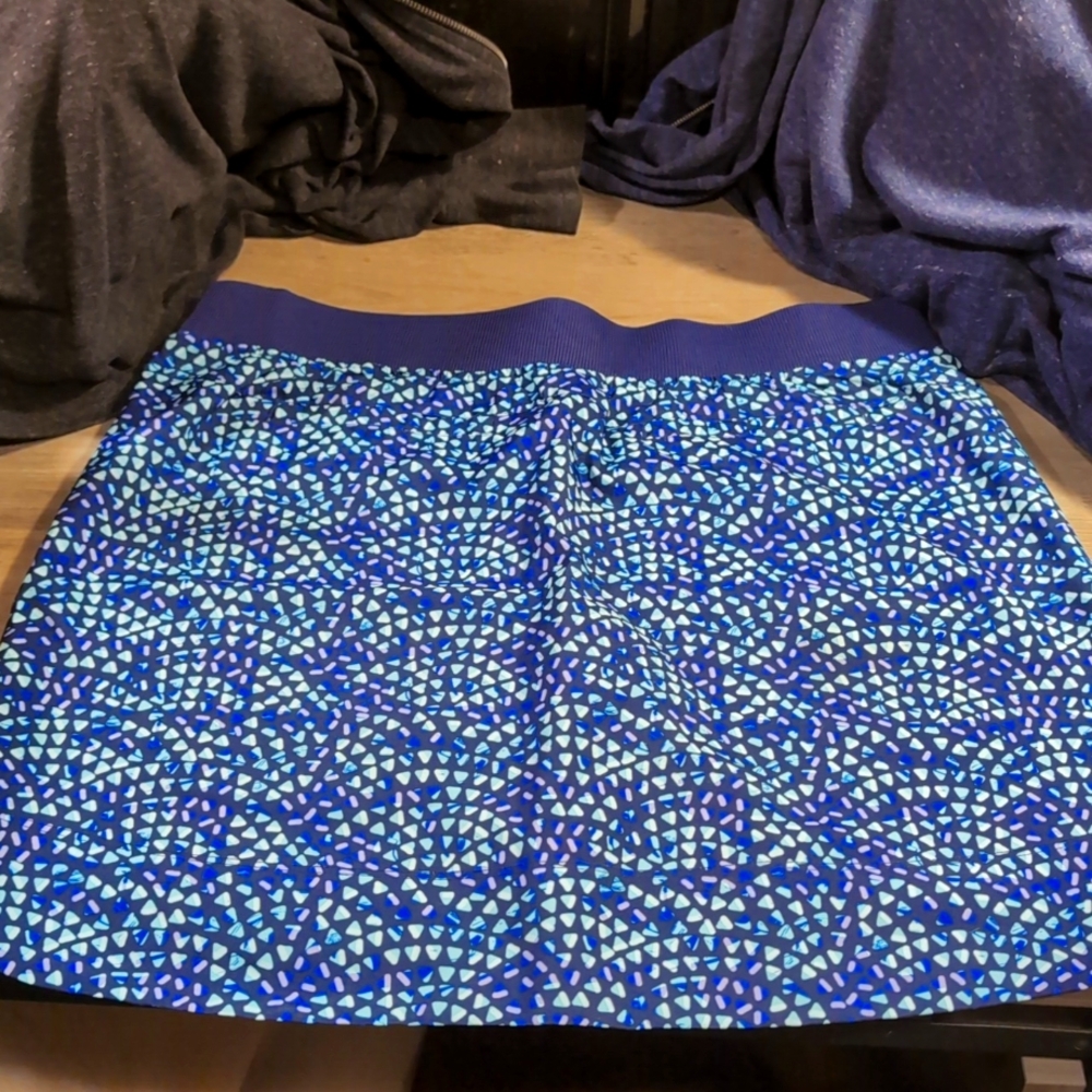 Skort, M